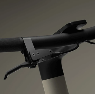 Close-up of a sleek black brake lever and handlebar grip of an electric bike.
